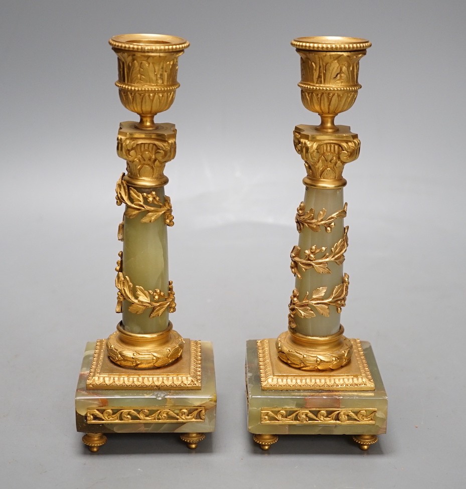 A pair of neoclassical revival green onyx and ormolu candlesticks, c.1900 - 20cm tall